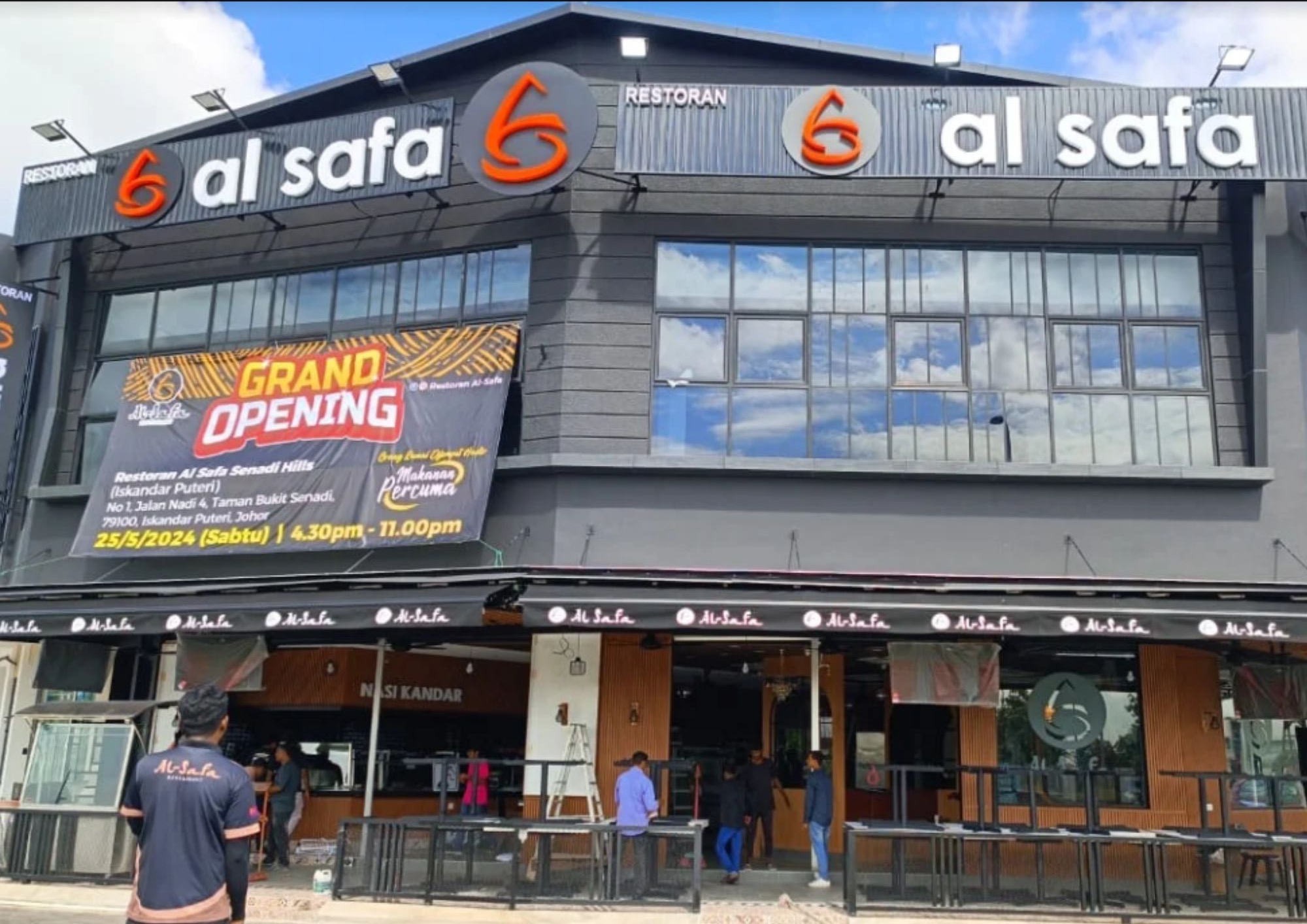 Al-Safa Mamak Café storefront with dark facade and orange brand signage in Johor Bahru