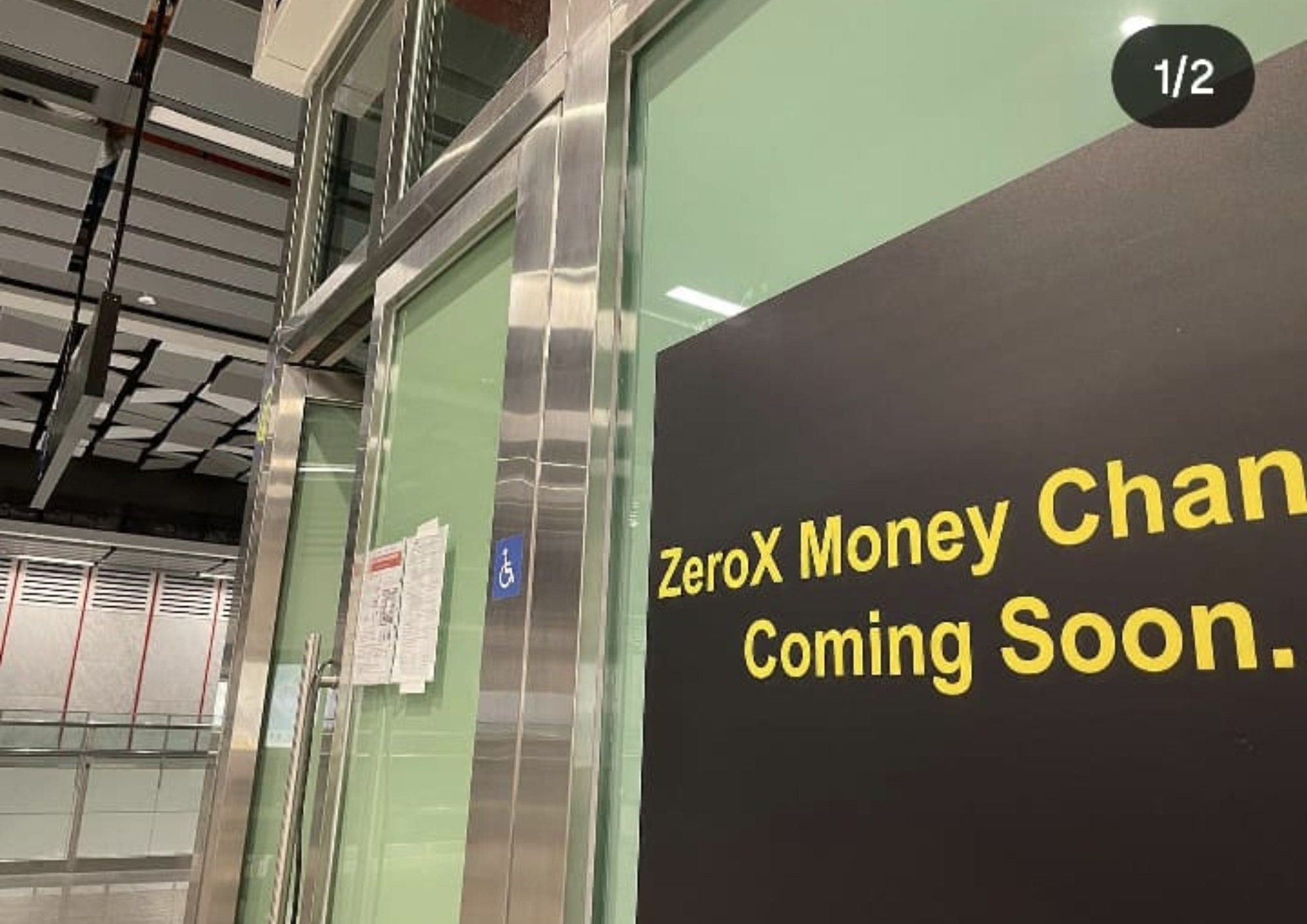 Zeroex Money Changer coming soon banner at second outlet under construction